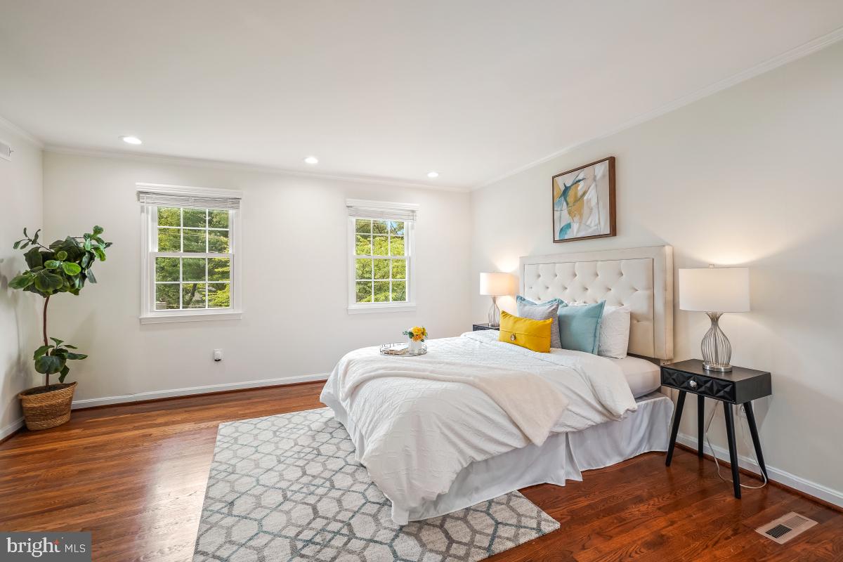 1816 Bart Drive Silver Spring, MD 20905 - Photo 18 of 38 a bedroom with a bed and wooden floor