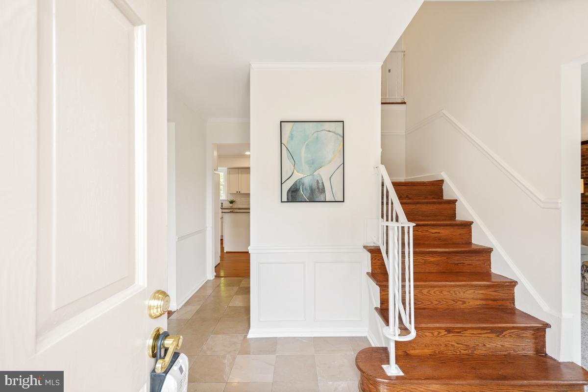 1816 Bart Drive Silver Spring, MD 20905 - Photo 4 of 38 a view of a hallway with wooden floor and entryway