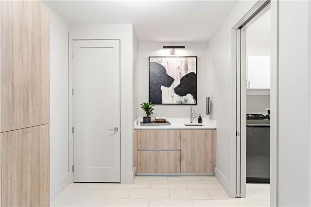 a view of a livingroom with furniture and hardwood floor