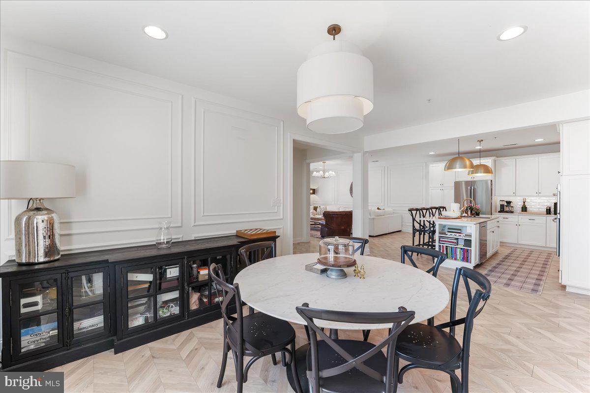 1202 Summit Drive Royersford, PA 19468 - Photo 17 of 35 a view of a dining room with furniture and wooden floor