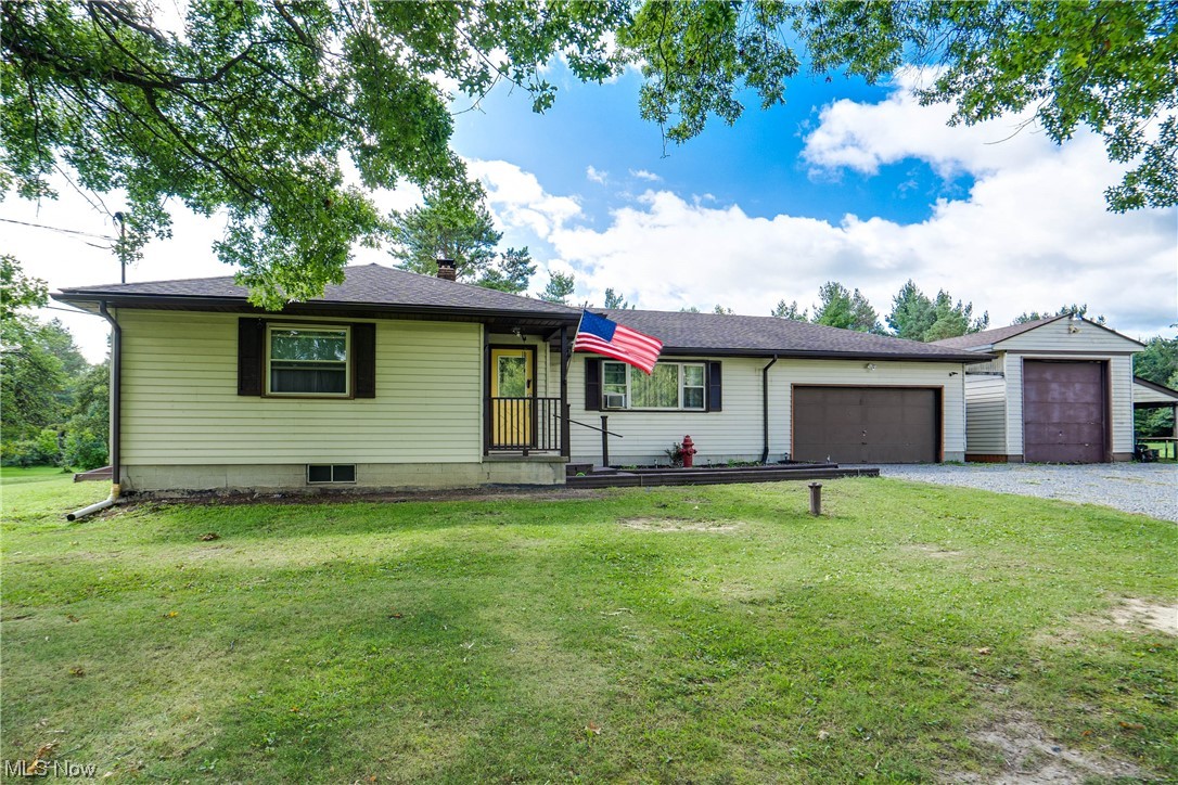7384 Clark Road Atwater, OH 44201 - Photo 17 of 26 Ranch-style home featuring a front yard and garage
