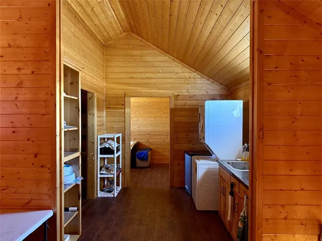 a bedroom with a bed and a view of bathroom