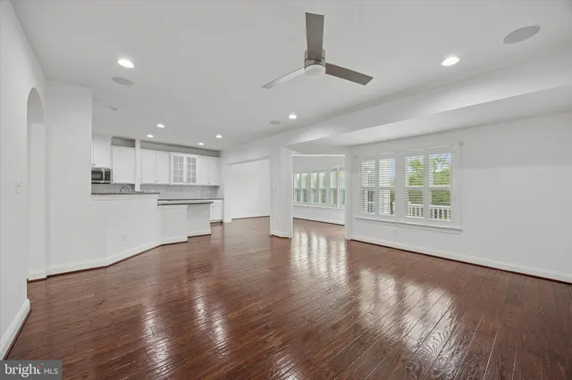 a view of kitchen with wooden floor and window