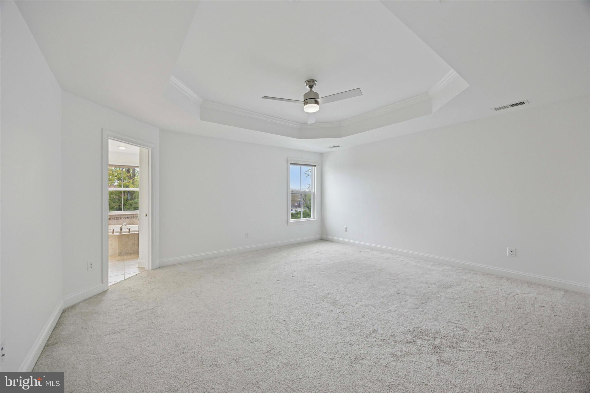 322 Quarry Point Road Malvern, PA 19355 - Photo 14 of 29 an empty room with a ceiling fan and a window