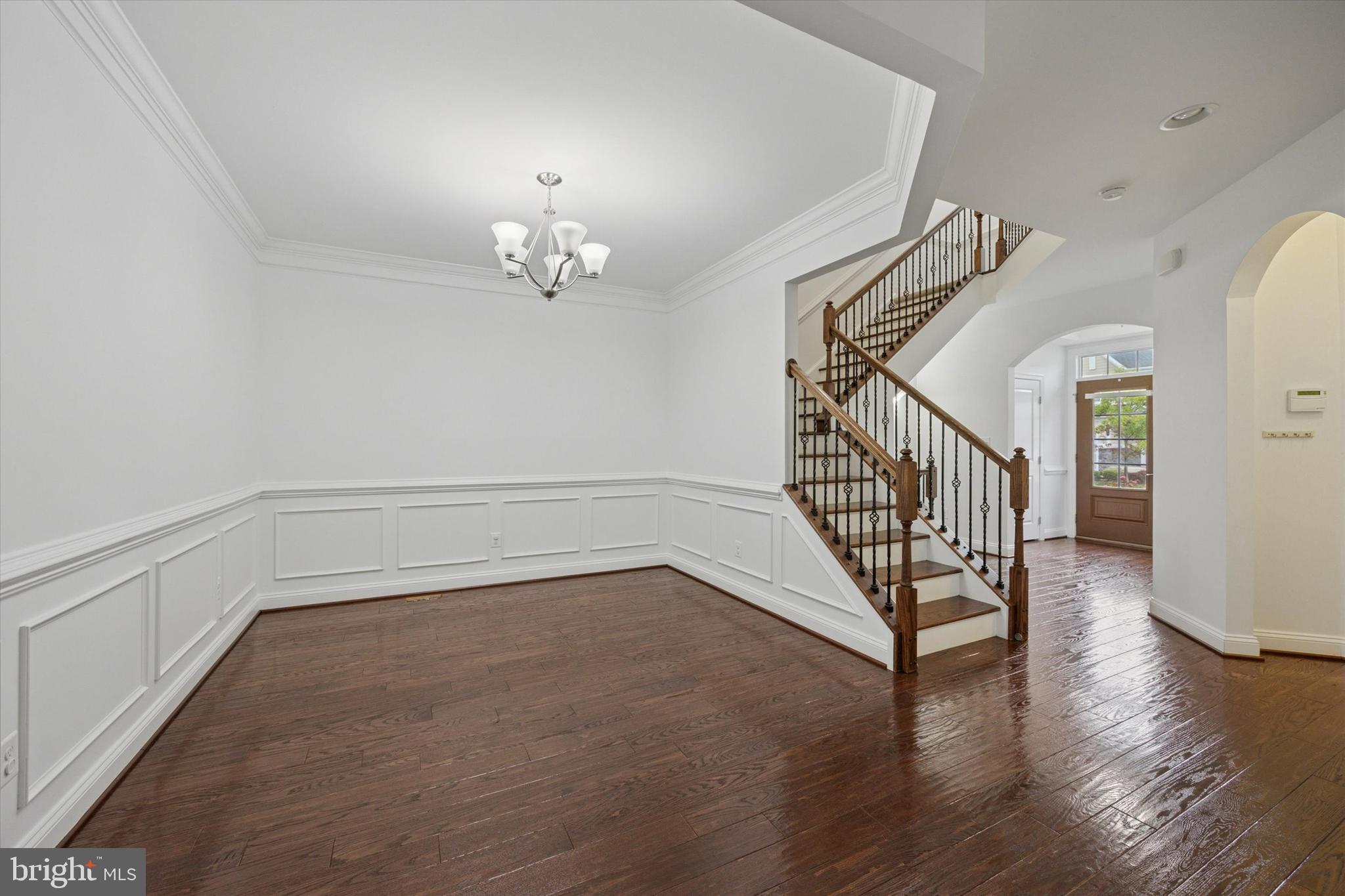 322 Quarry Point Road Malvern, PA 19355 - Photo 5 of 29 a view of a livingroom with wooden floor and stairs