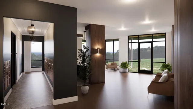 a hallway with wooden floor and furniture