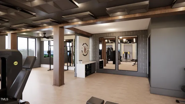 a view of a hallway with living room