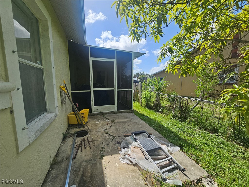 2912 Woodside Avenue Naples, FL 34112 - Photo 8 of 16 a view of backyard with seating space