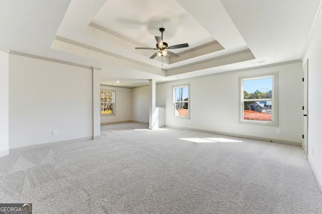 a large bathroom with a double vanity sink and a large mirror