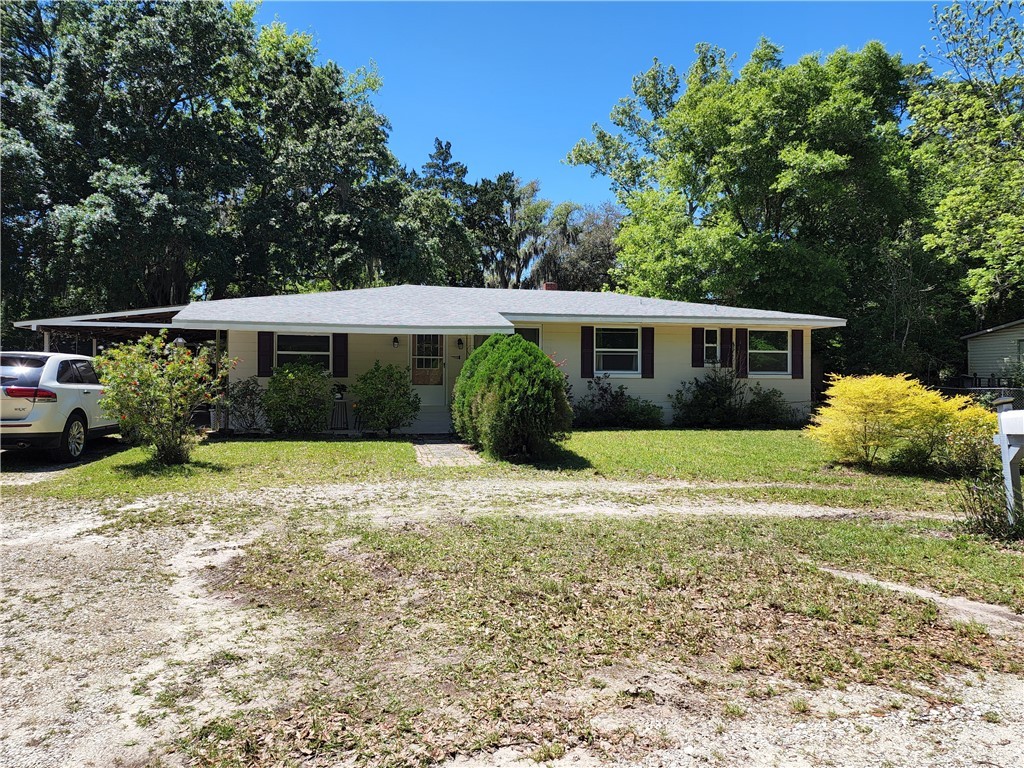 a house view with a garden space