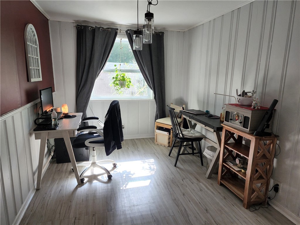 86007 Jones Road Yulee, FL 32097 - Photo 8 of 12 a view of a dining room with furniture window and wooden floor