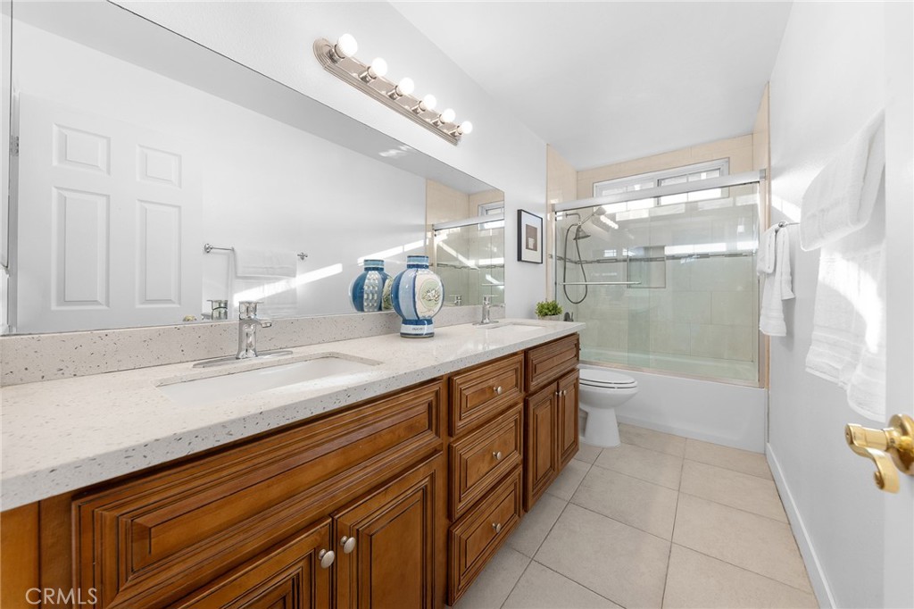 550 Great Bend Drive Diamond Bar, CA 91765 - Photo 26 of 41 a bathroom with a granite countertop sink a toilet and shower