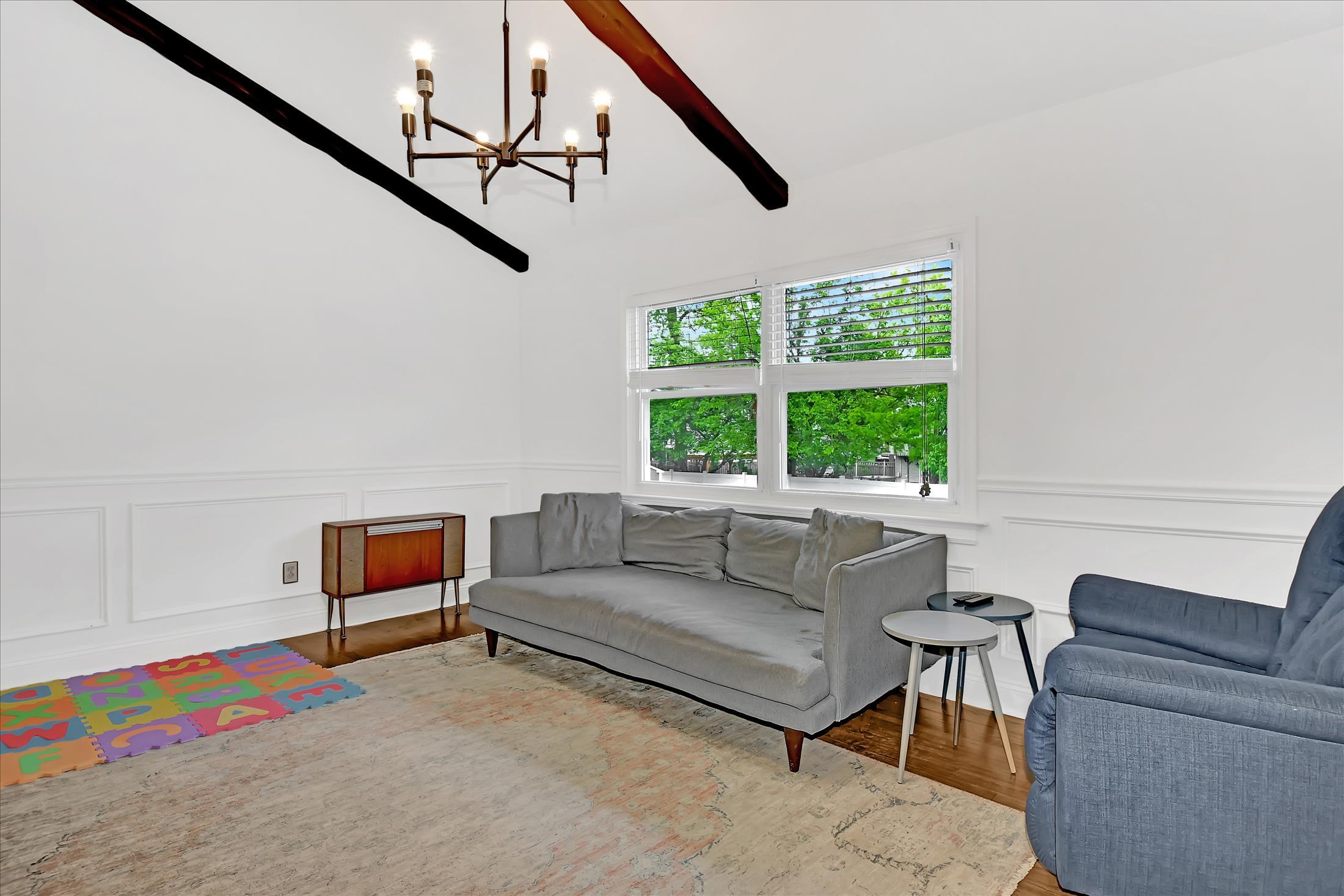 675 Harmony Road Middletown, NJ 07748 - Photo 9 of 25 a living room with furniture and a window