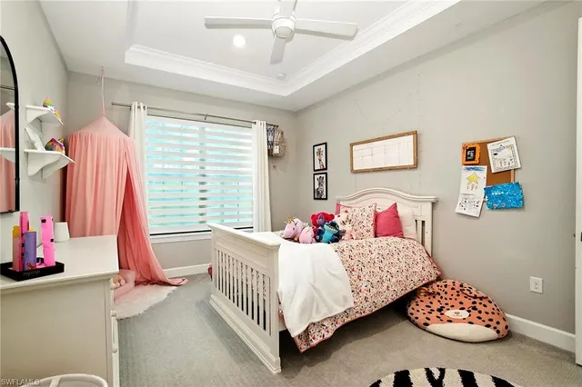 a bedroom with a bed and a table