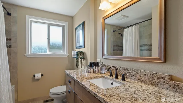 a room with furniture and a flat screen tv