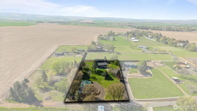 a view of a lake with a yard