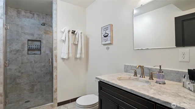 a bed room with a bed and a window