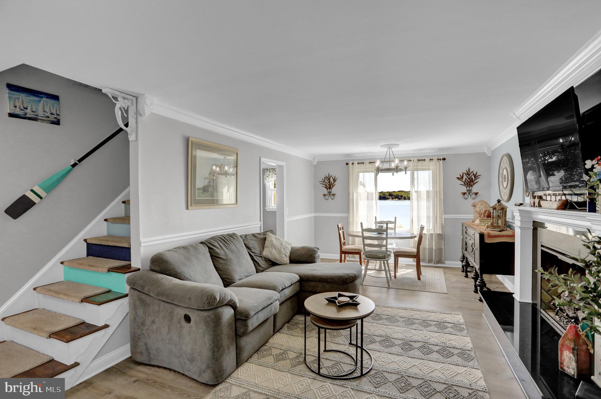 4017 East Baker Avenue Abingdon, MD 21009 - Photo 13 of 86 a living room with furniture and a flat screen tv