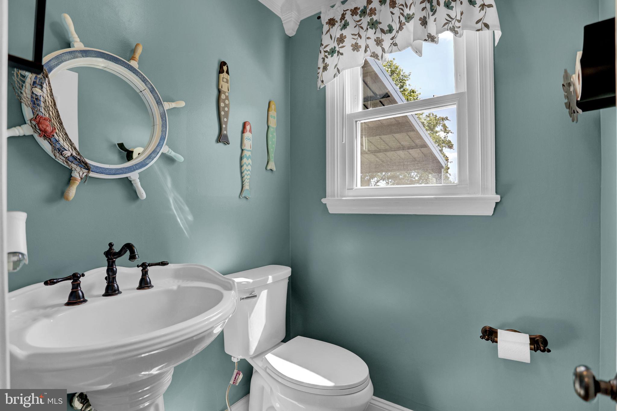 4017 East Baker Avenue Abingdon, MD 21009 - Photo 20 of 86 a bathroom with a toilet a sink and mirror