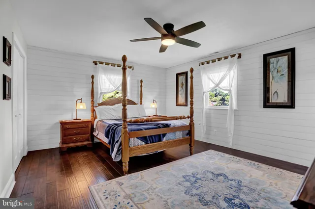 a bathroom with a tub and shower