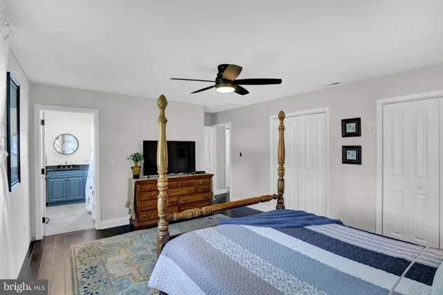 a view of a livingroom with furniture and a flat screen tv