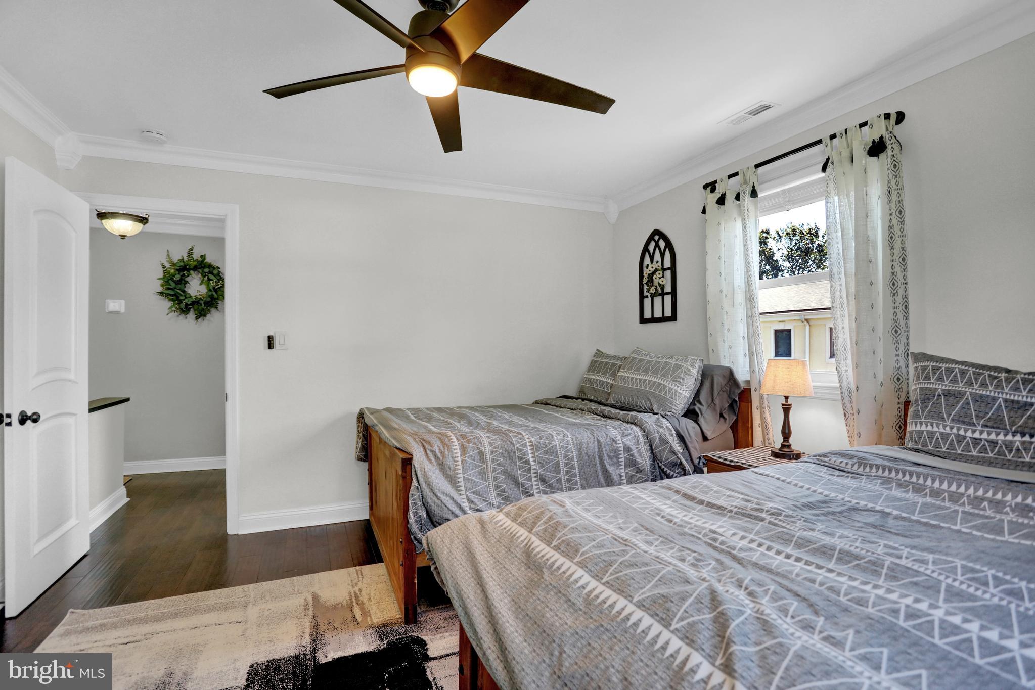 4017 East Baker Avenue Abingdon, MD 21009 - Photo 28 of 86 a bedroom with two beds and a window