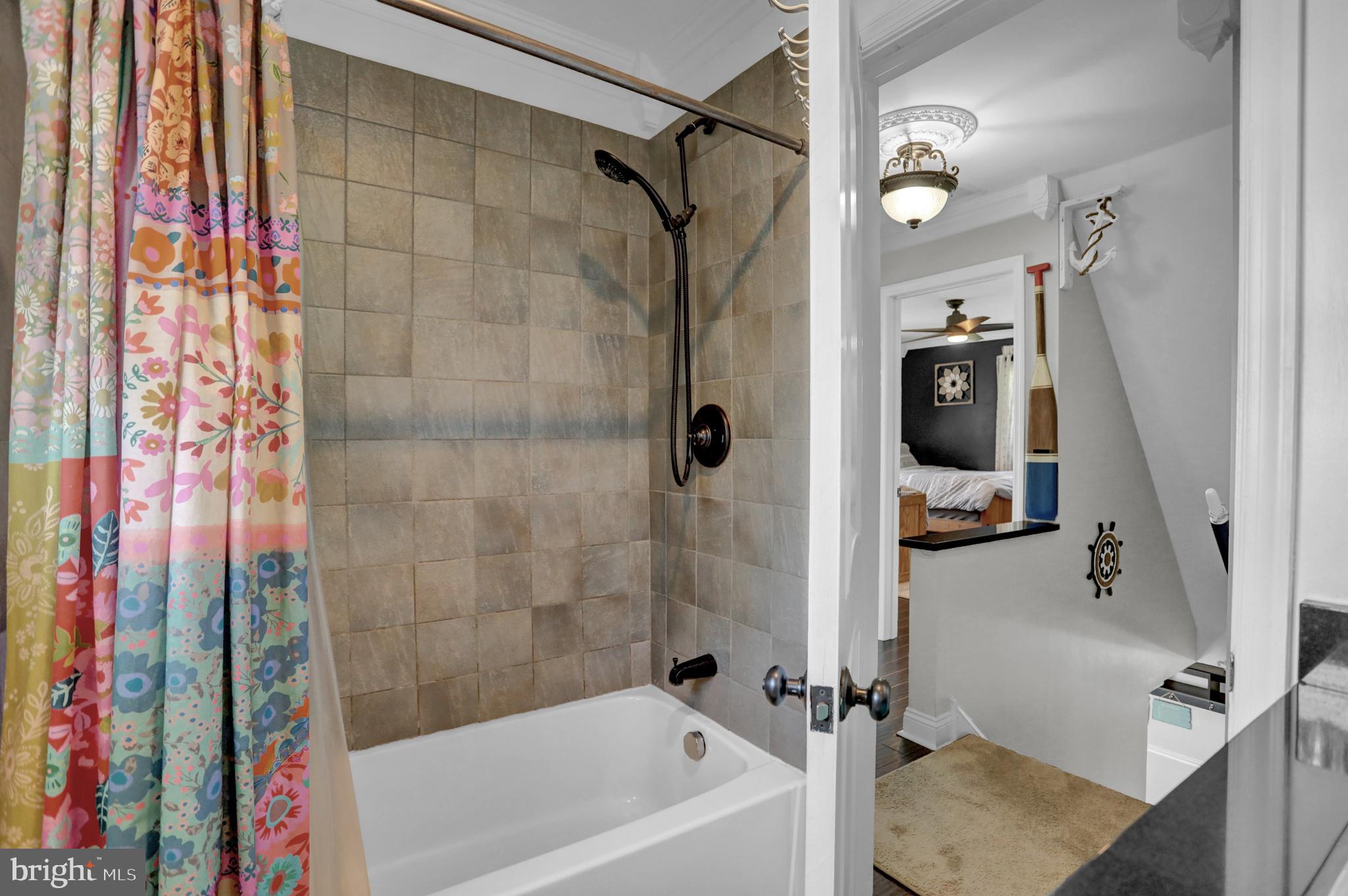 4017 East Baker Avenue Abingdon, MD 21009 - Photo 33 of 86 a bathroom with a tub and shower