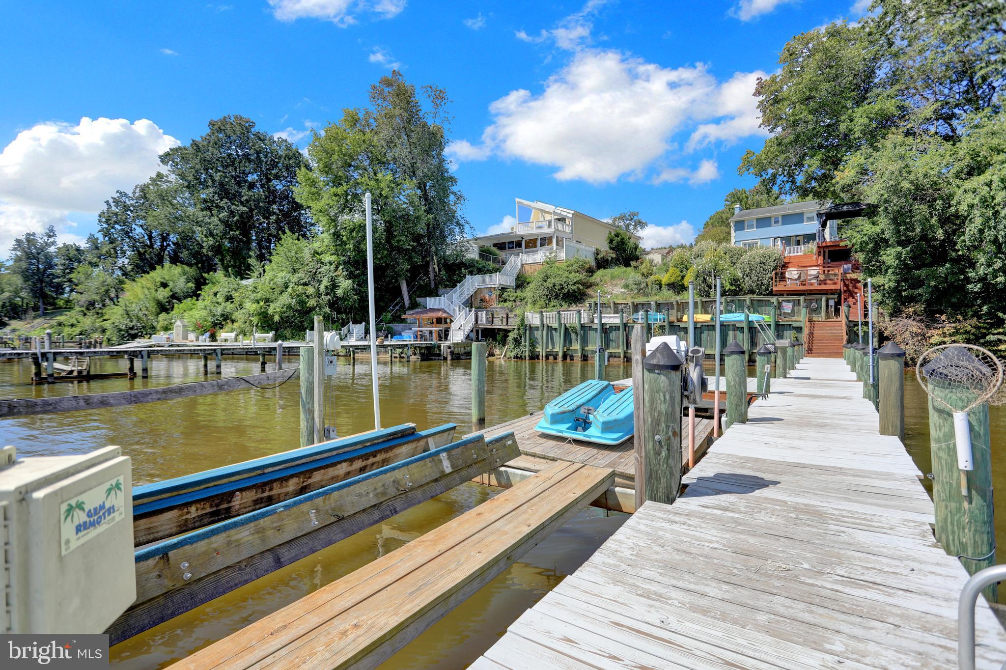 4017 East Baker Avenue Abingdon, MD 21009 - Photo 50 of 86 a view of a lake with a wooden deck