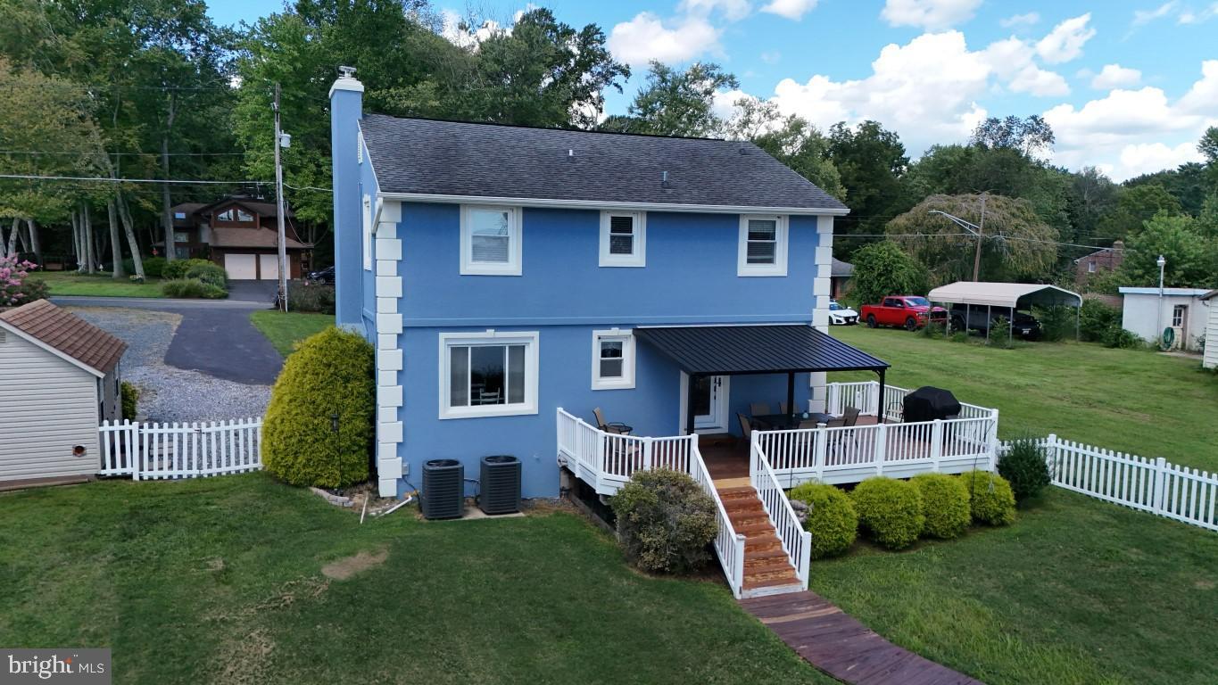 4017 East Baker Avenue Abingdon, MD 21009 - Photo 55 of 86 a aerial view of a house with a yard table and chairs