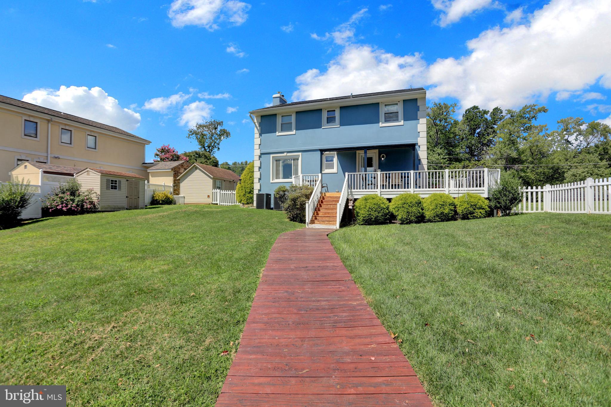 4017 East Baker Avenue Abingdon, MD 21009 - Photo 58 of 86 a front view of a house with a yard