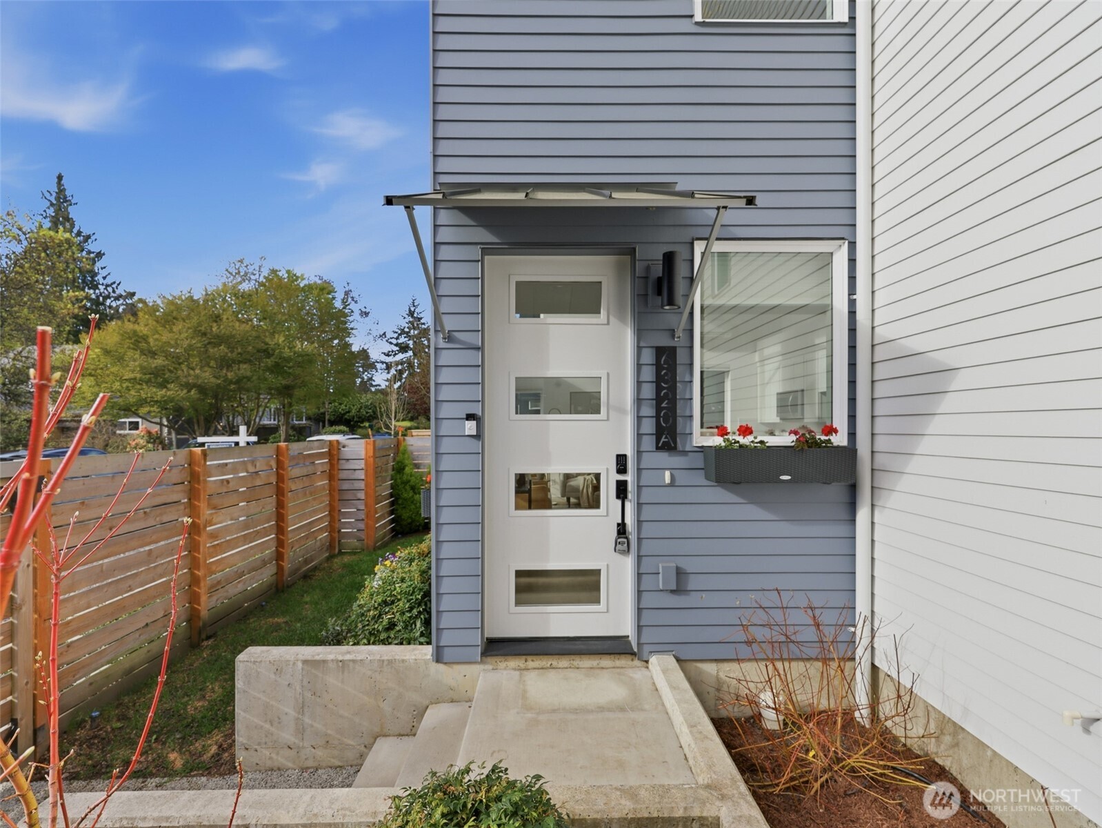 6320 41st Avenue Southwest, Unit A Seattle, WA 98136 - Photo 30 of 39 a view of a house with a door