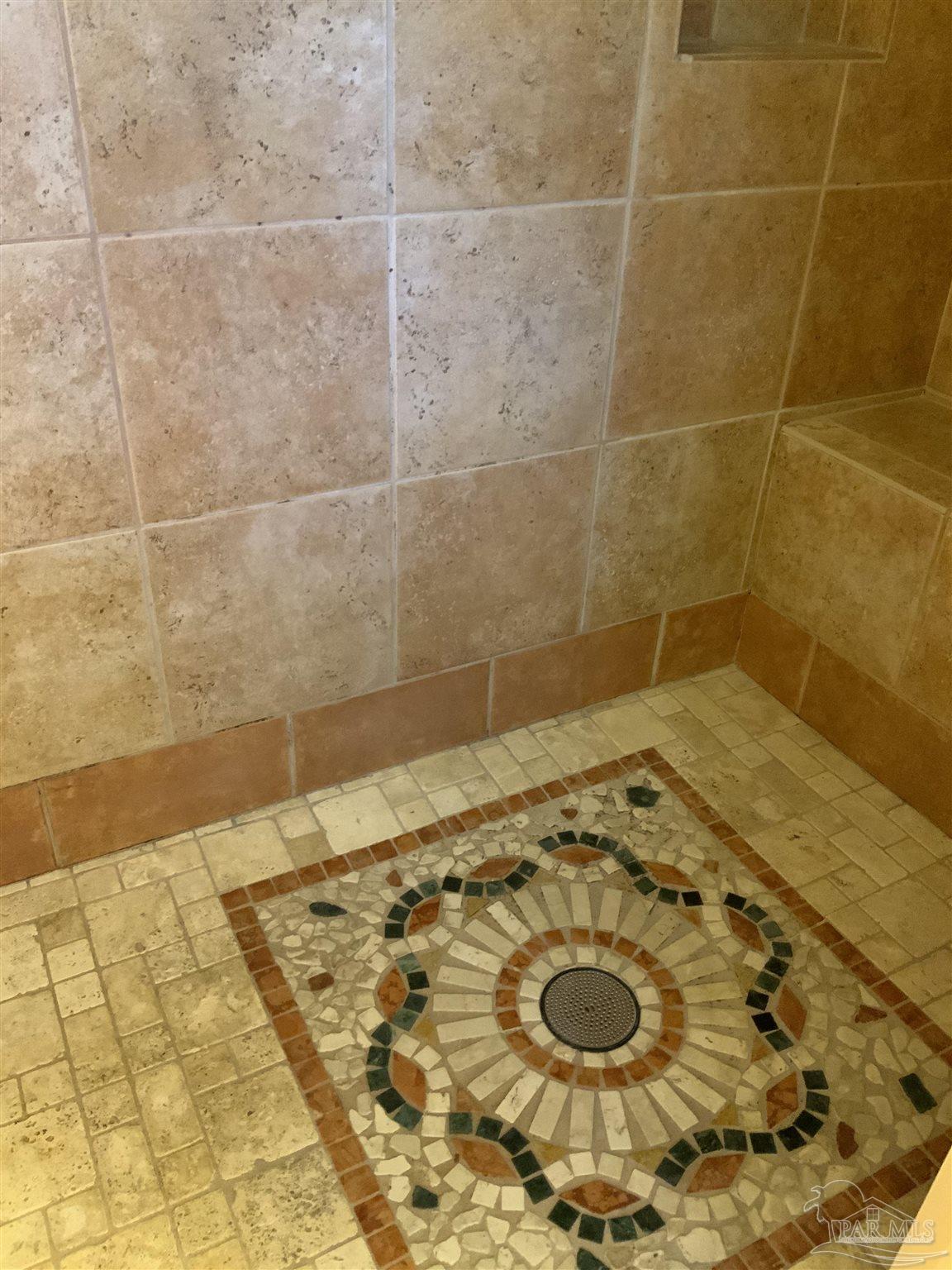 4867 Aleff Road Pace, FL 32571 - Photo 36 of 41 a bathroom with a sink and a shower