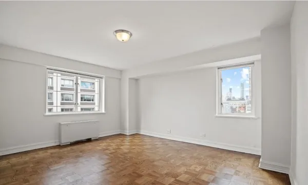 an empty room with windows