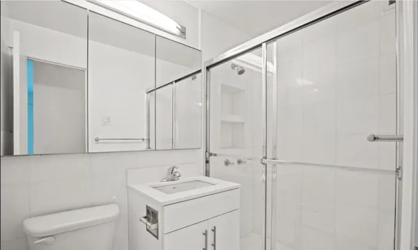 a bathroom with a sink and mirror