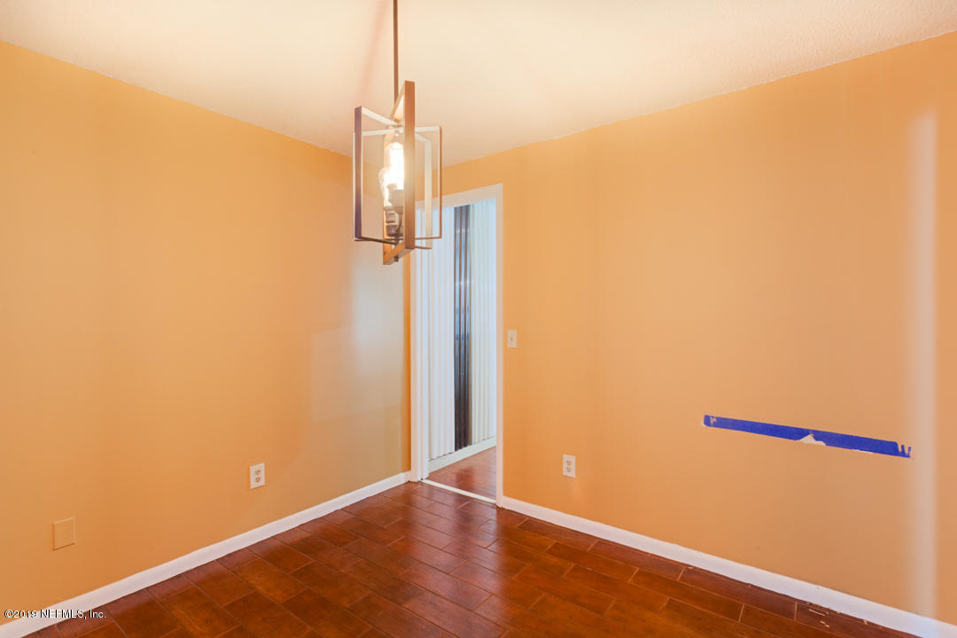 8759 Moss Haven Road Jacksonville, FL 32221 - Photo 16 of 29 a view of a room with wooden floor