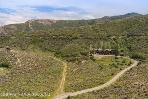 a view of a lake from a mountain