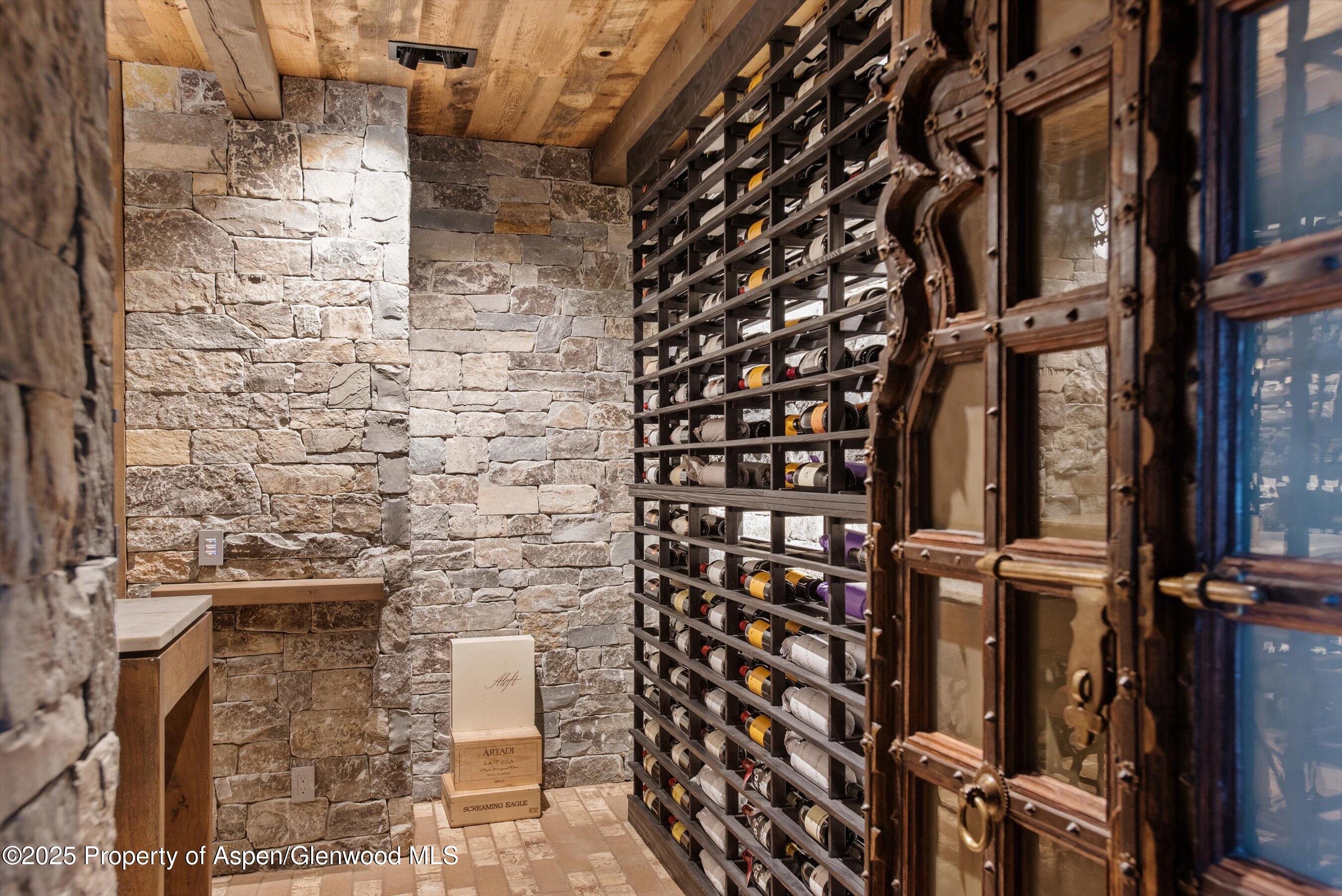 2318 Lazy O Road Snowmass, CO 81654 - Photo 36 of 50 view of a brick building