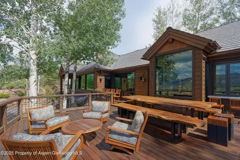 a view of a patio with furniture