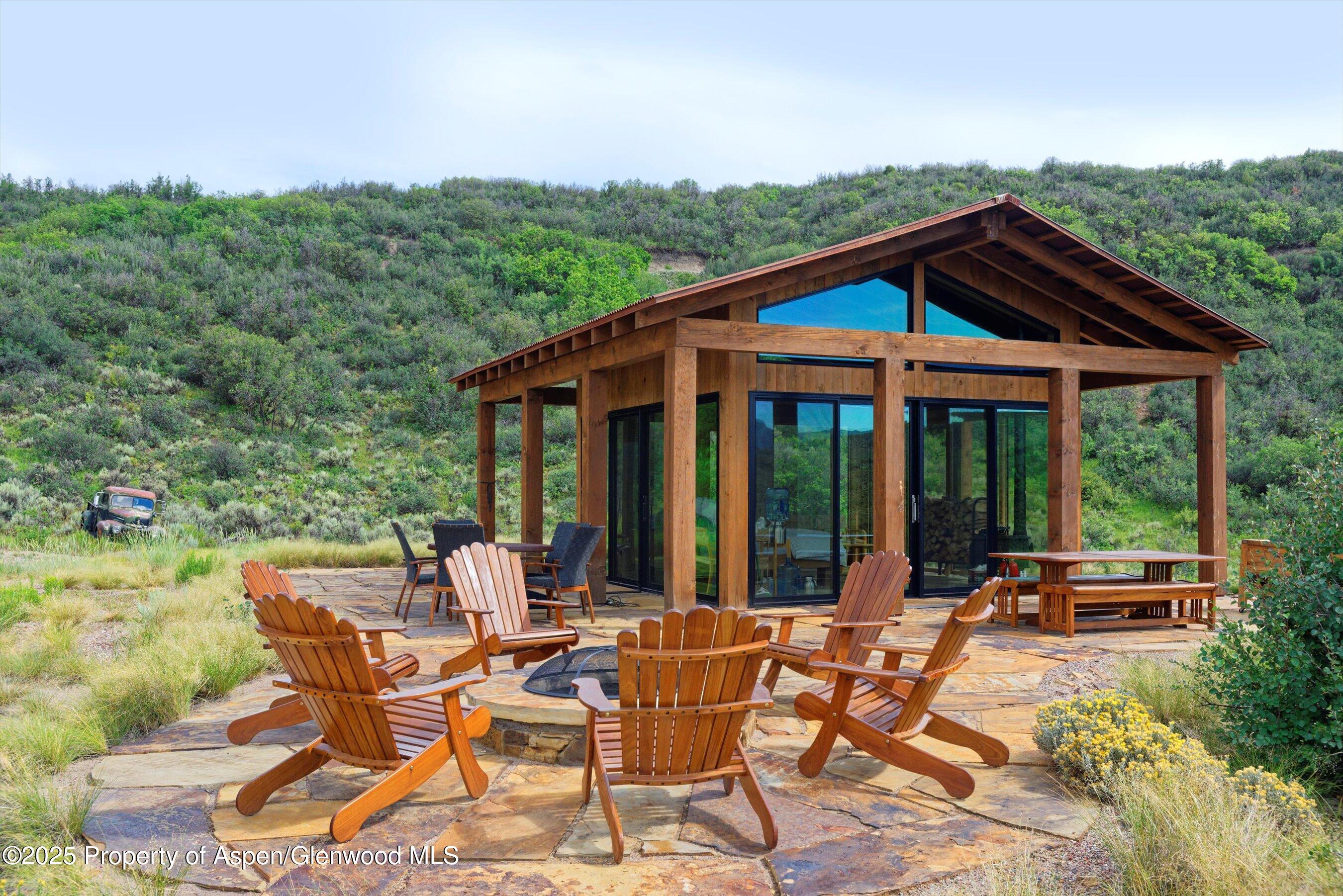 2318 Lazy O Road Snowmass, CO 81654 - Photo 43 of 50 an outdoor space with furniture and garden view