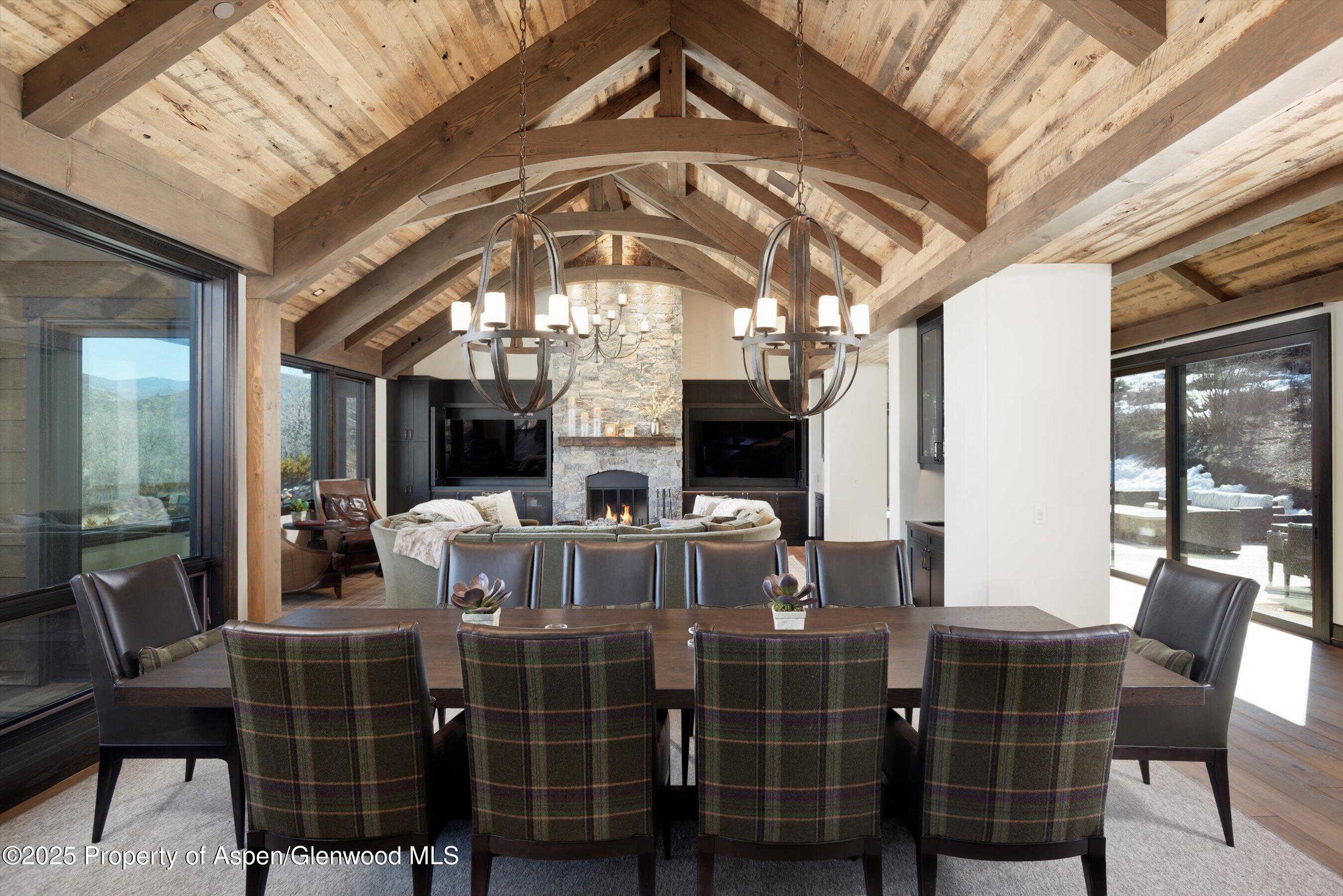 2318 Lazy O Road Snowmass, CO 81654 - Photo 6 of 50 a view of a dining room with furniture window and outside view