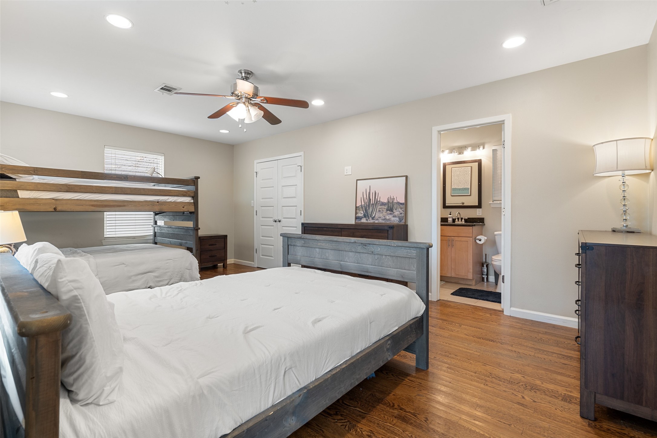 3504 Speedway, Unit A&B Austin, TX 78705 - Photo 12 of 29 a bedroom with bed and wooden floor