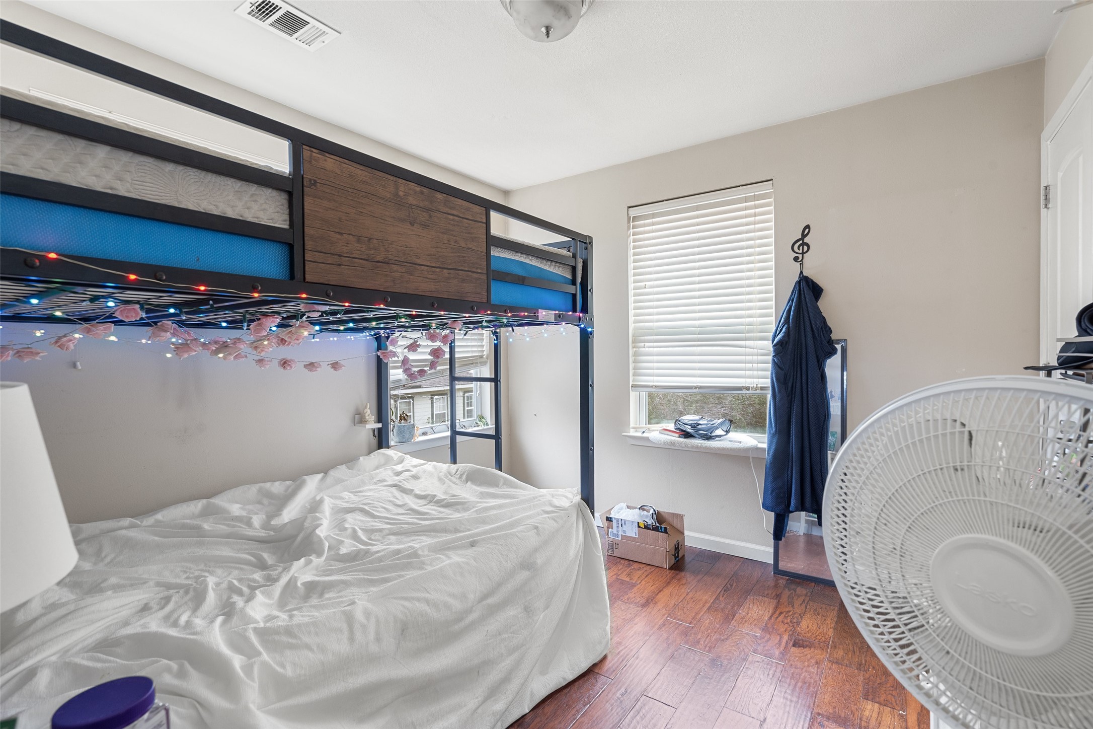 3504 Speedway, Unit A&B Austin, TX 78705 - Photo 13 of 29 a bedroom with a large bed and a large window
