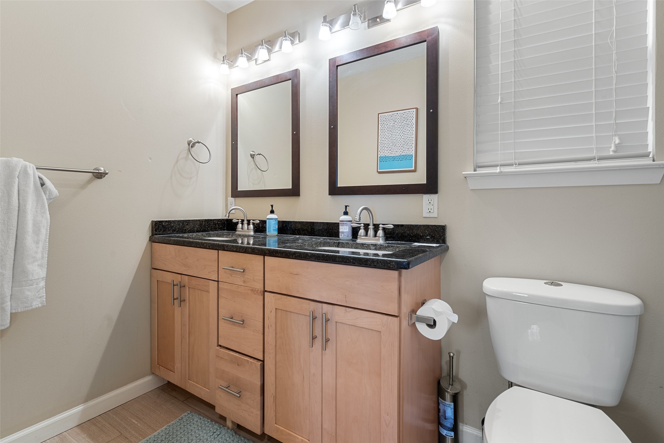 3504 Speedway, Unit A&B Austin, TX 78705 - Photo 15 of 29 a bathroom with a toilet sink and mirror