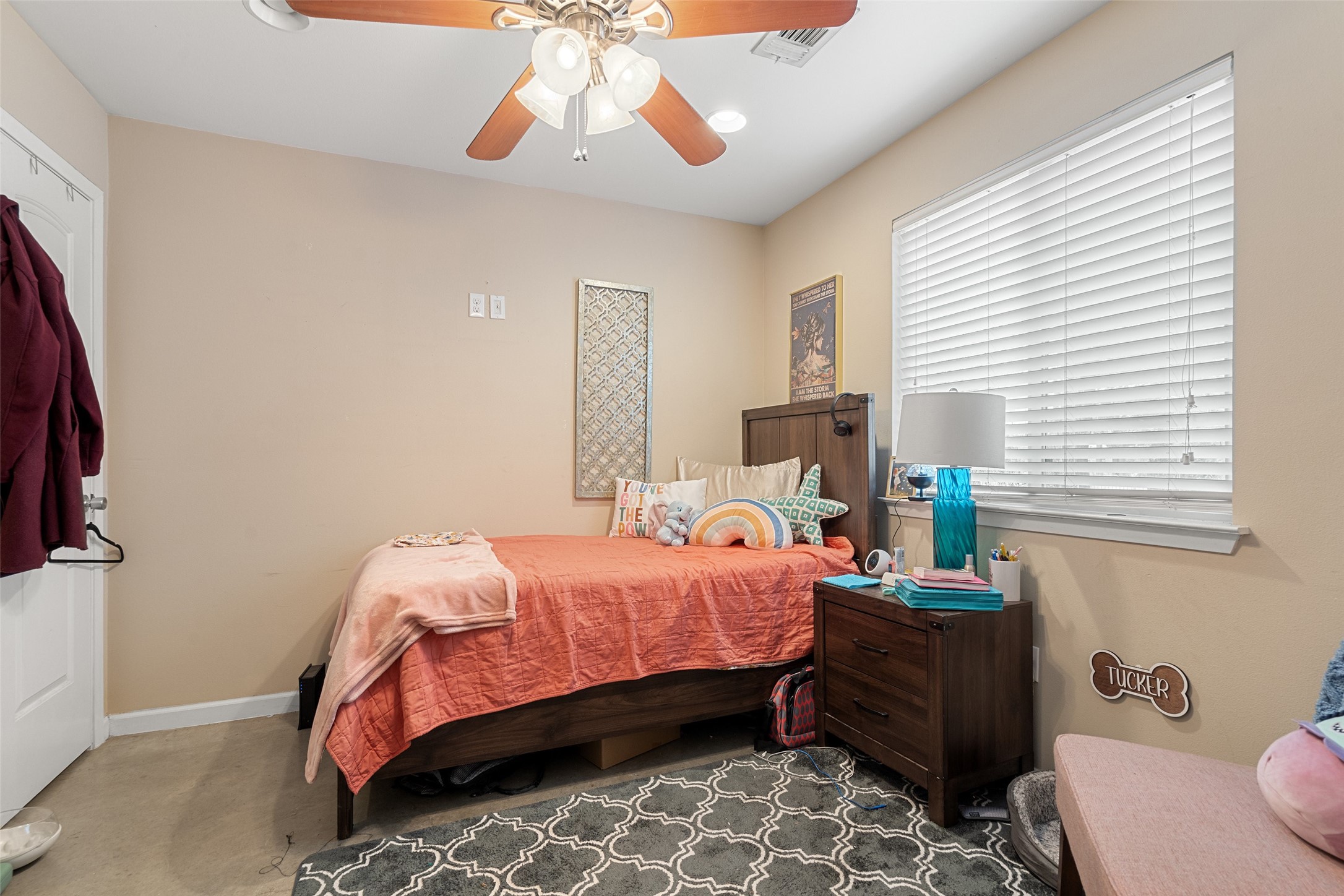 3504 Speedway, Unit A&B Austin, TX 78705 - Photo 25 of 29 a bedroom with a bed and a chandelier