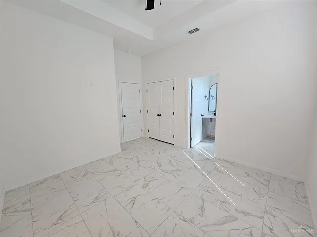 a bathroom with a double vanity sink and mirror