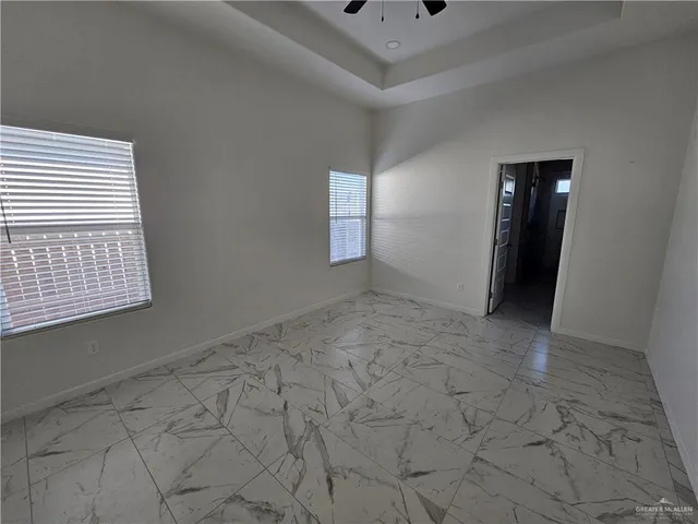 a view of houses with a street