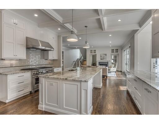 77 Edwardel Road Needham, MA 02492 - Photo 3 of 10 a kitchen with stainless steel appliances granite countertop a lot of counter space and wooden floors