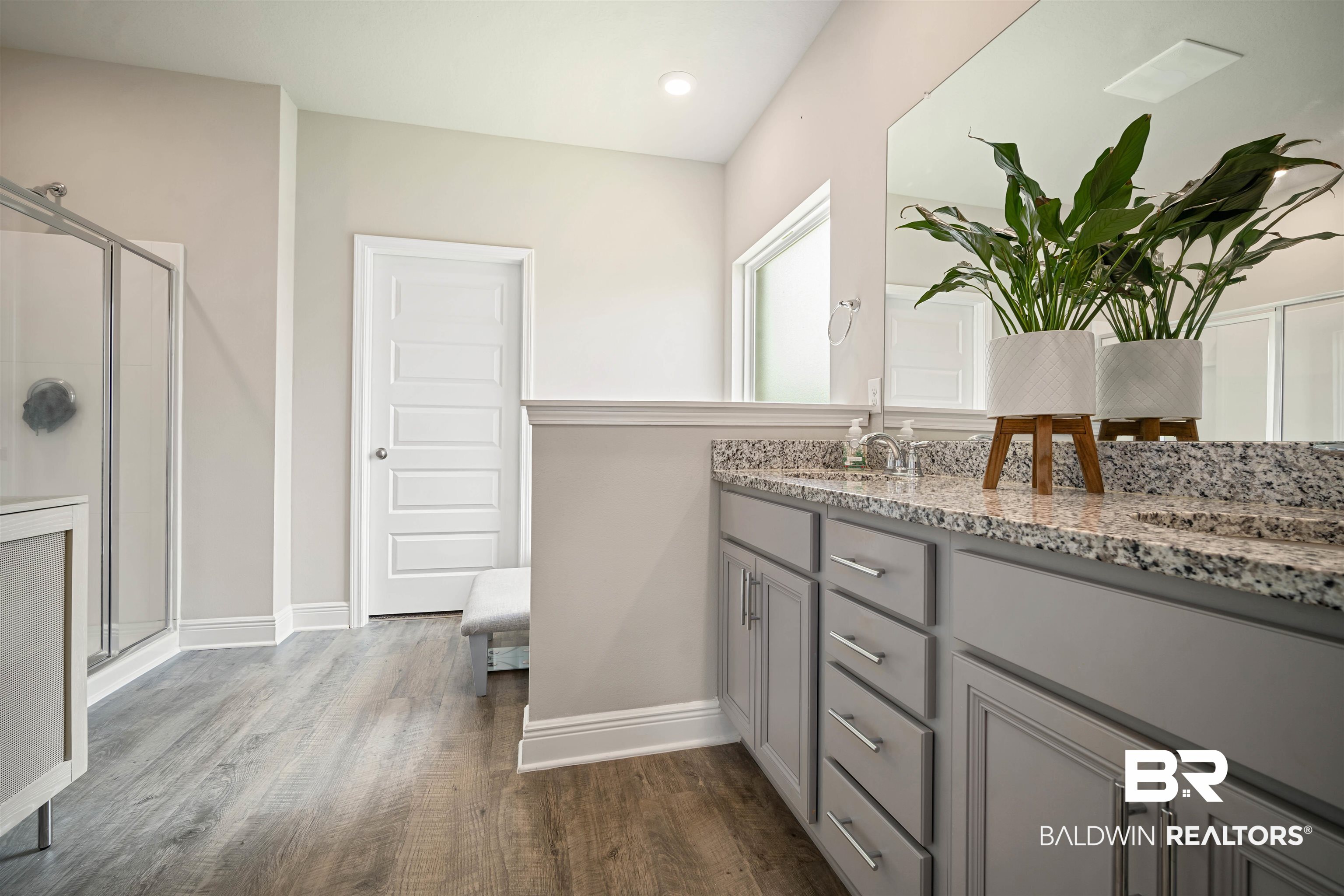 10474 Loamy Avenue Mobile, AL 36695 - Photo 16 of 31 Full bathroom featuring wood finished floors, a shower stall, vanity, and recessed lighting and walk in closet