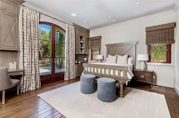 a very nice looking room with a large window and chandelier