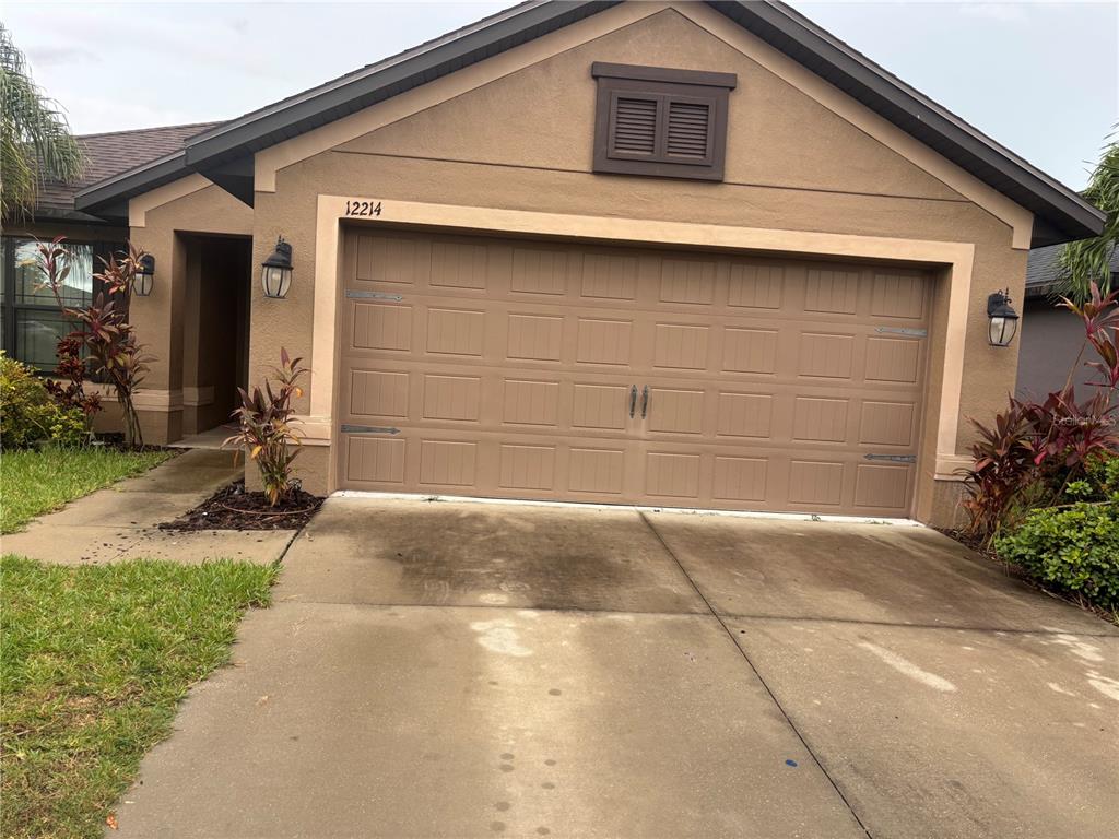 12214 Legacy Bright Street Riverview, FL 33578 - Photo 1 of 16 a house with a outdoor space